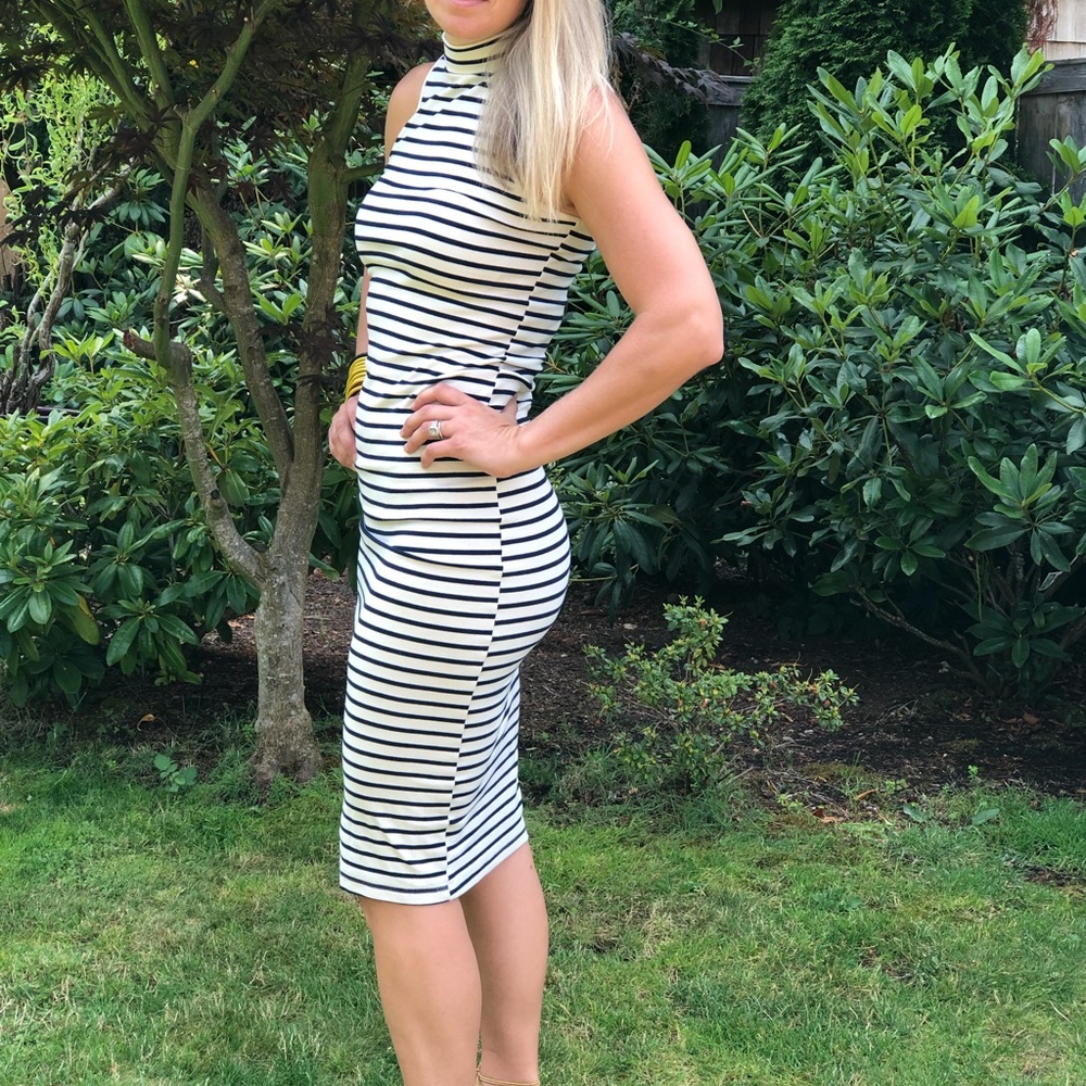 Used. Fitted midi striped cotton dress